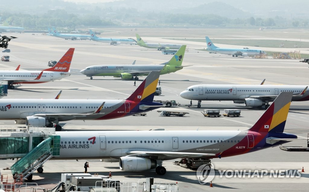 资料图片：首尔金浦机场停机坪 韩联社