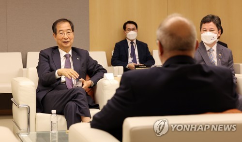 韩总理赴法国为釜山申博造势