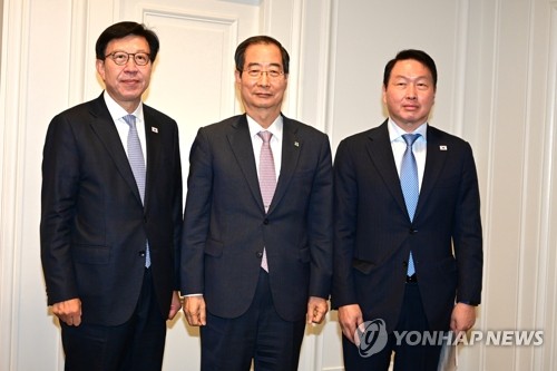 韩总理：防弹和潘基文将为釜山申办世博助力