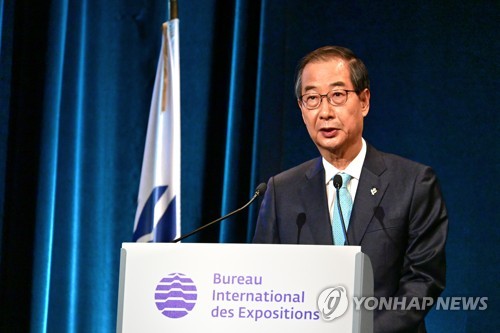 韩总理结束世博申办拉票之行回国