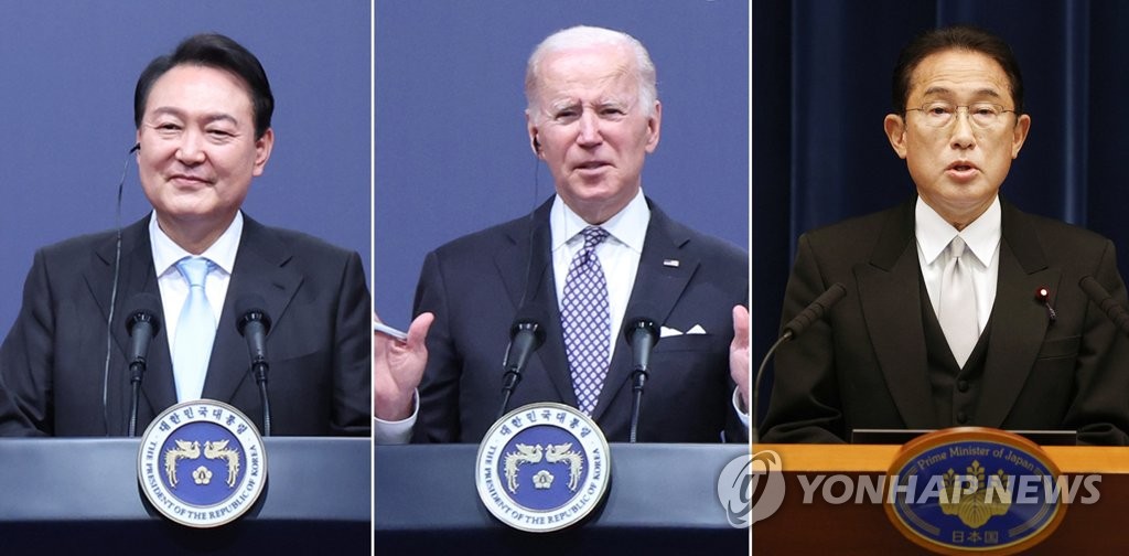 资料图片：左起依次为韩国总统尹锡悦、美国总统拜登、日本首相岸田文雄。 韩联社