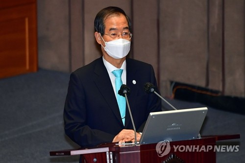 7月27日，韩国国务总理韩悳洙出席国会问政会。 韩联社/国会摄影记者团
