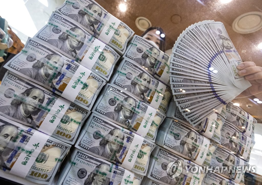 资料图片：美元钞票 韩联社