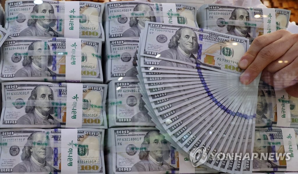 资料图片：坚挺的美元 韩联社