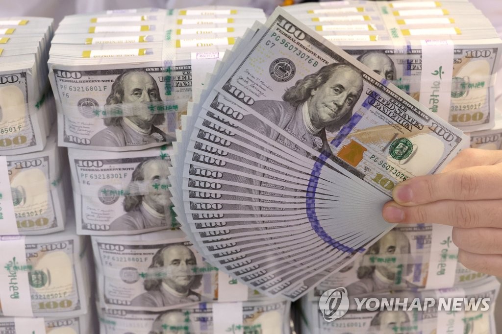 资料图片：美元钞票 韩联社