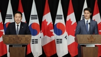 韩加领导人商定将两国关系升格为全面战略伙伴关系