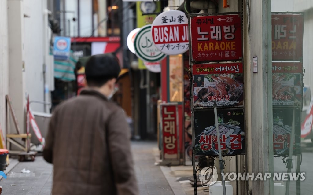 资料图片：一条商业街 韩联社