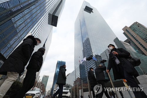 资料图片：高楼大厦鳞次栉比。 韩联社
