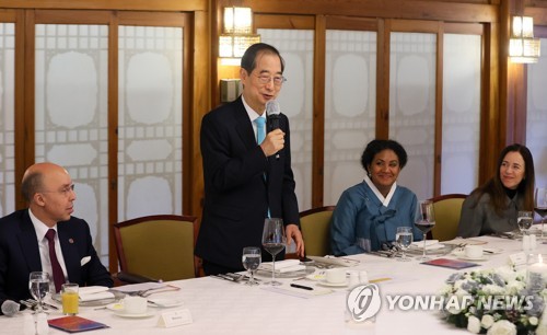 韩总理吁外国驻韩大使团支持釜山申办世博会