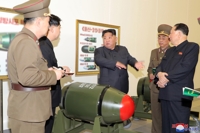 金正恩指导核武器兵器化工作