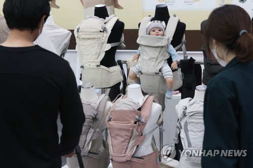 经合组织：韩国奶爸育婴假期最长 实际使用率偏低