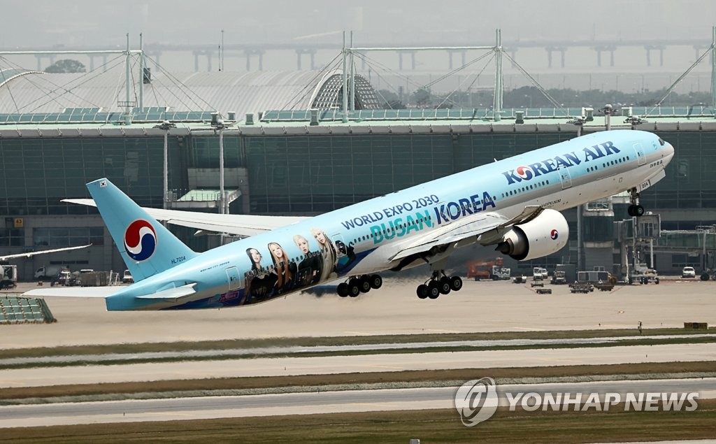 资料图片：大韩航空粉墨主题申博彩绘客机 韩联社