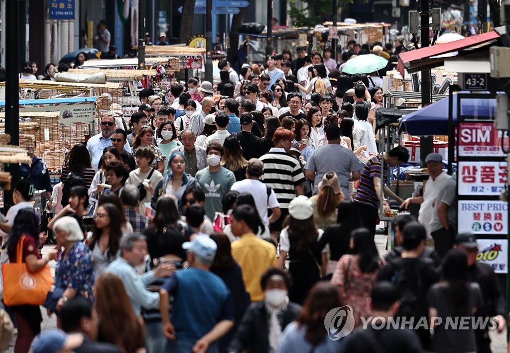 资料图片：首尔明洞街头，摄于6月6日。 韩联社
