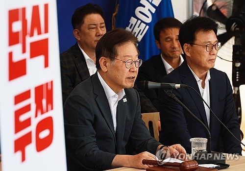韩检方再就对朝汇款案传唤最大在野党首李在明