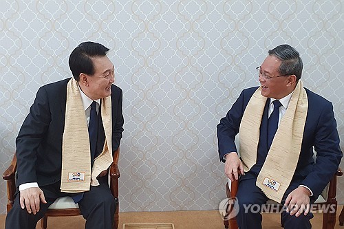 尹锡悦和李强在印度再次聚首进行交流