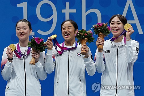 韩国女子羽毛球队亚运摘金
