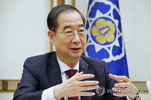 韩总理接受韩联社采访谈医改和经济外交问题