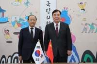 韩执政党高层会见中国大使