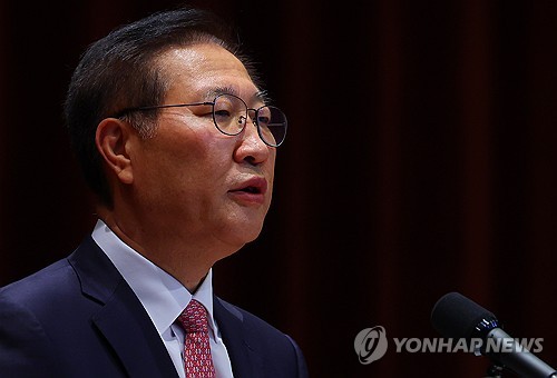 Arrest warrant sought for ex-justice minister over alleged martial law involvement