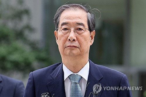 Ex-PM Han's insurrection trial to be held once a week