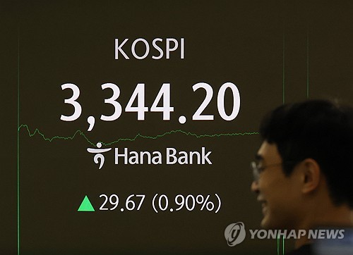 Seoul shares set new record high on tech gains, hopes for withdrawal of tax revision proposal