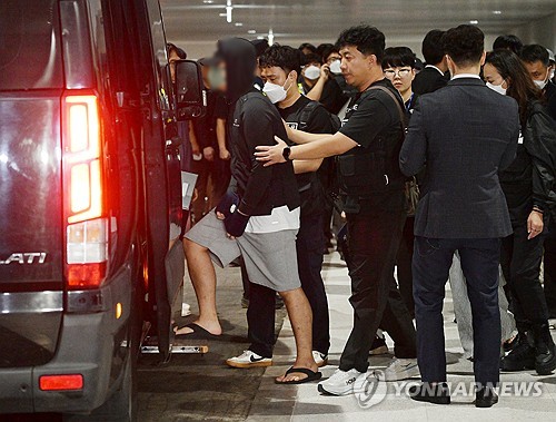 Police transfer 11 Cambodia scam suspects to prosecution