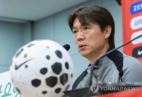 Coach pleased with players' dedication for nat'l football team