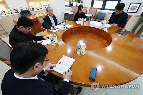 Football club's assistant coach offers to resign following suspension over alleged racist gesture