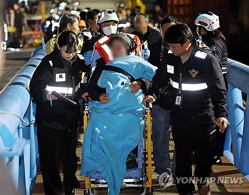 Ferry enters port after all 267 aboard rescued in accident