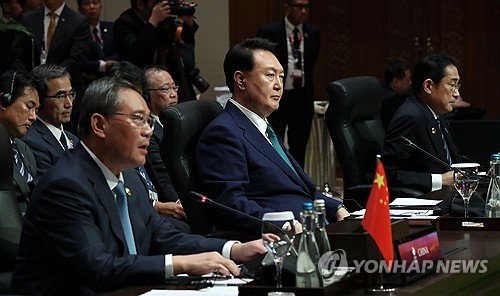 韩政府：韩中日就26—27日办峰会进行最后协调